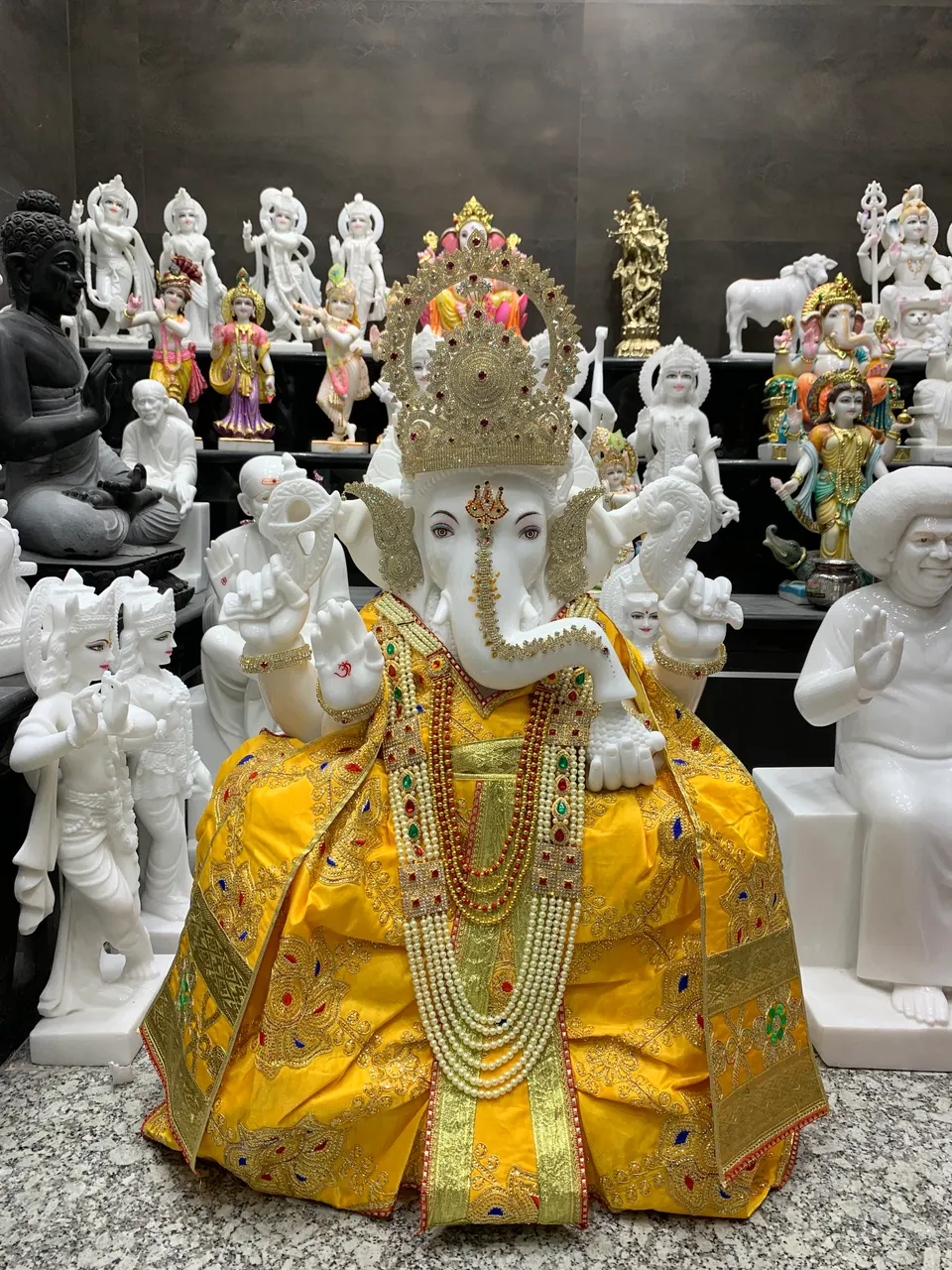 Handcrafted white marble idol shrine
